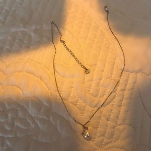 Swarovski Pearl necklace with a crystal on top of the Pearl